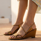 Candela Burnished Gold Heel – Bronze, on model