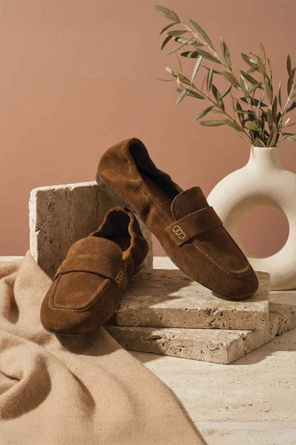 Classic women’s soft moccasin shoes with slip-on design