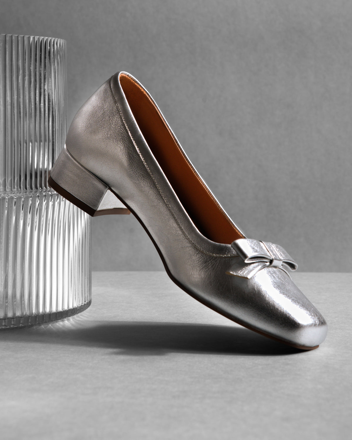Arco Front Bow Pump Shoes, Silver — 09 styled