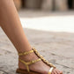 Luméve – Gilded Wrap-Strap Sandals