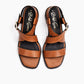 Pair of brown sandals with black soles