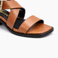 Brown sandal with criss-cross straps